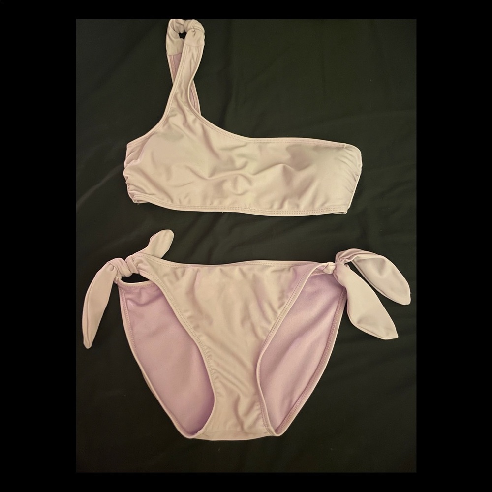light lavender one shoulder swimsuit. size small. bought from dillards.